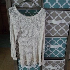 Loosely knit sweater.